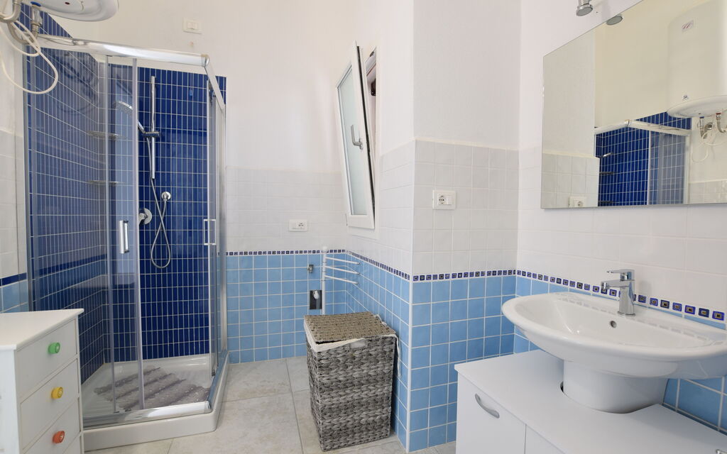 Villa Del Sole In Budoni Sea View: Autumn, Bathroom, Spring, Summer