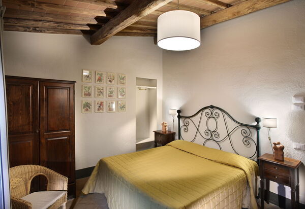 Agriturismo la Papessa: agriturismo-la-papessa-chianti-san-donato-multiproprietà-melograno-camera-da-letto