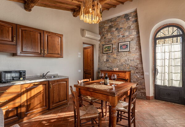 Agriturismo la Papessa: agriturismo-la-papessa-chianti-san-donato-multiproprietà-melograno-sala-da-pranzo