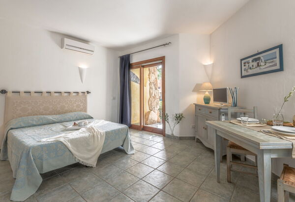 Casa D'orso Green Village Sardegna: Autunno, Camera da letto, Estate, Primavera