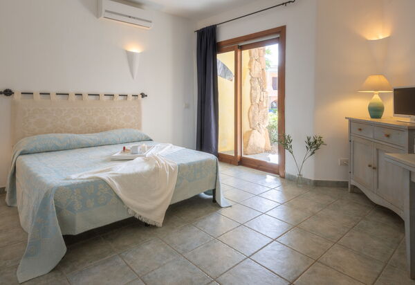 Casa D'orso Green Village Sardegna: Autunno, Camera da letto, Estate, Primavera