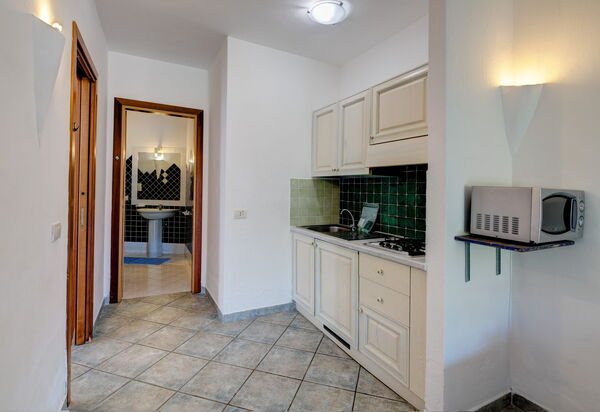 Casa Faro Green Village Sardegna: Autunno, Cucina, Estate, Primavera