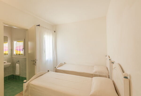 Baia Bianca Apartments Sardinia: Autunno, Camera da letto, Estate, Inverno, Primavera