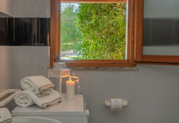 San Teodoro Apartments: Autunno, Bagno, Estate, Inverno, Primavera