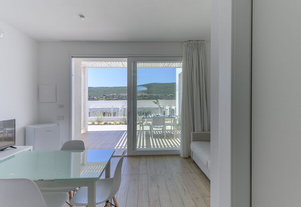 Charming Apartment Ac In Stintino: Autunno, Estate, Inverno, Primavera, Sala da pranzo