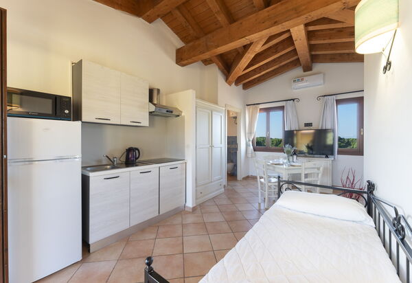 Il Mirto Appartamenti, Ac e Wifi, Gallura: Autunno, Cucina, Estate, Inverno, Primavera, Soggiorno