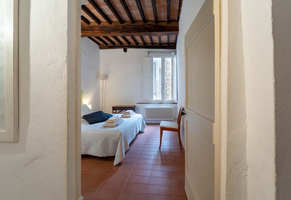 Le Loggine del Pignatello Apartment, Siena City: Bedroom