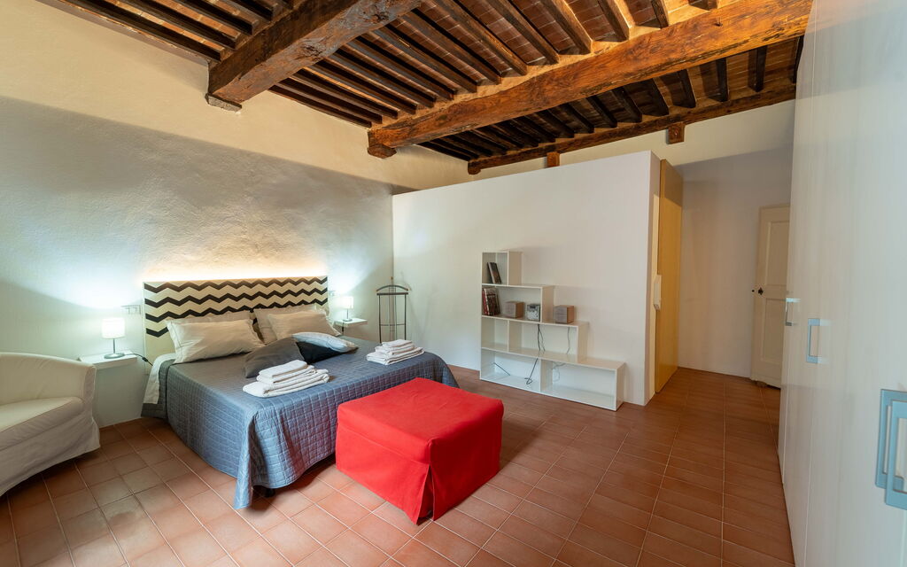 Le Loggine del Pignatello Apartment, Siena City: Camera da letto