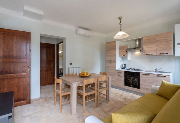 Pulciano Apartments: Autunno, Cucina, Estate, Primavera