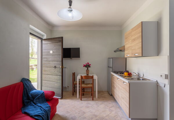 Pulciano Apartments: Autunno, Cucina, Estate, Primavera