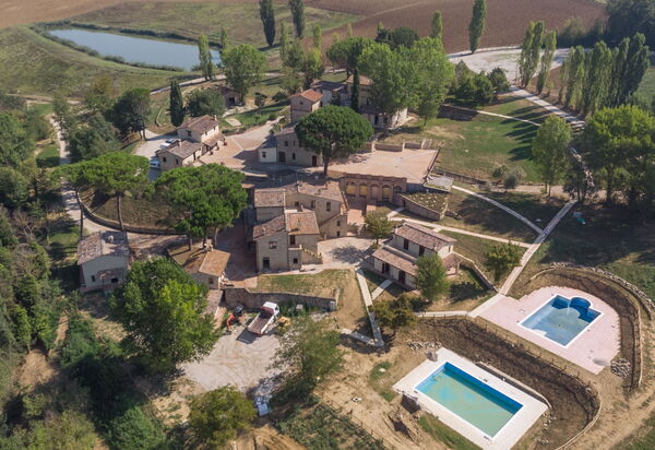 Pulciano Apartments: Autumn, Building Exterior, Spring, Summer