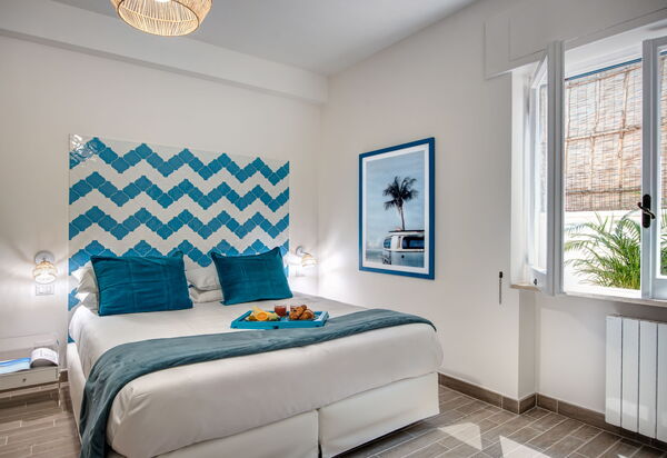 Cacti Home: cacti-home-sorrento-appartamento-camera-da-letto