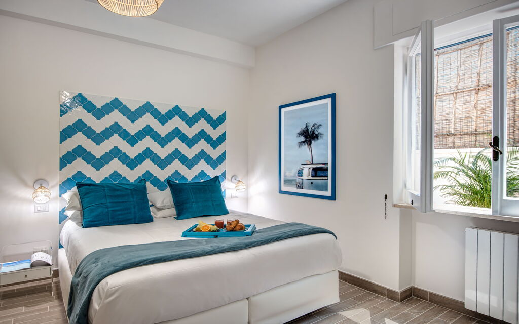 Cacti Home: cacti-home-sorrento-appartamento-camera-da-letto