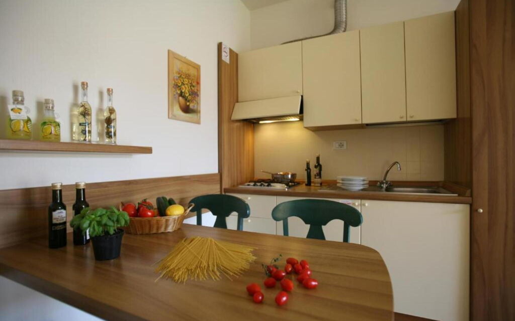 Villaggio Colombare - : villaggio-colombare-sirmione-mutliproperty-trilocale-comfort-living-room