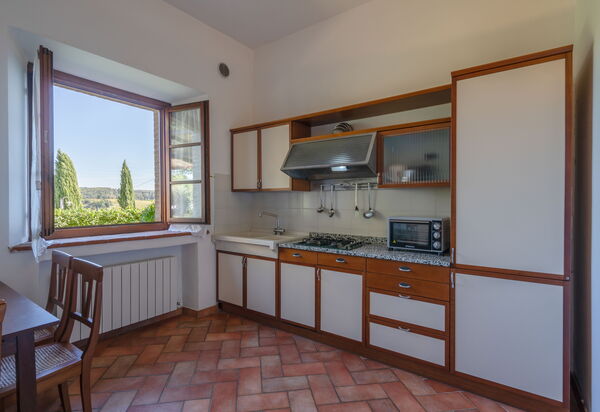 Rocche Di Valiano: rocche-di-valiano-chianti-castelnuovo-berardenga-multiproprietà-geranio-cucina