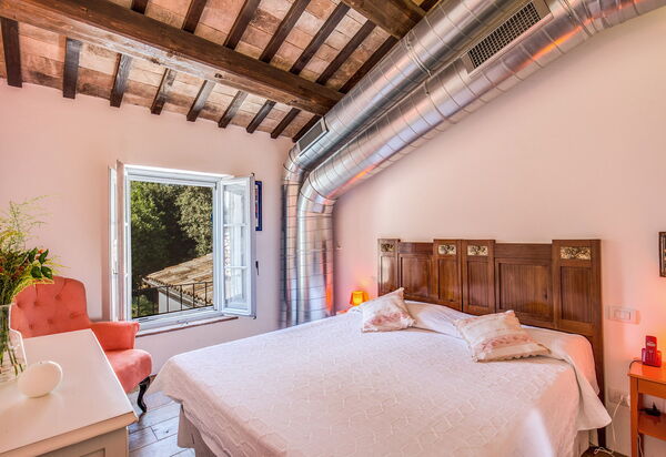 La Corte Del Grano: la-corte-del-grano-abbadia-villa-camera-da-letto