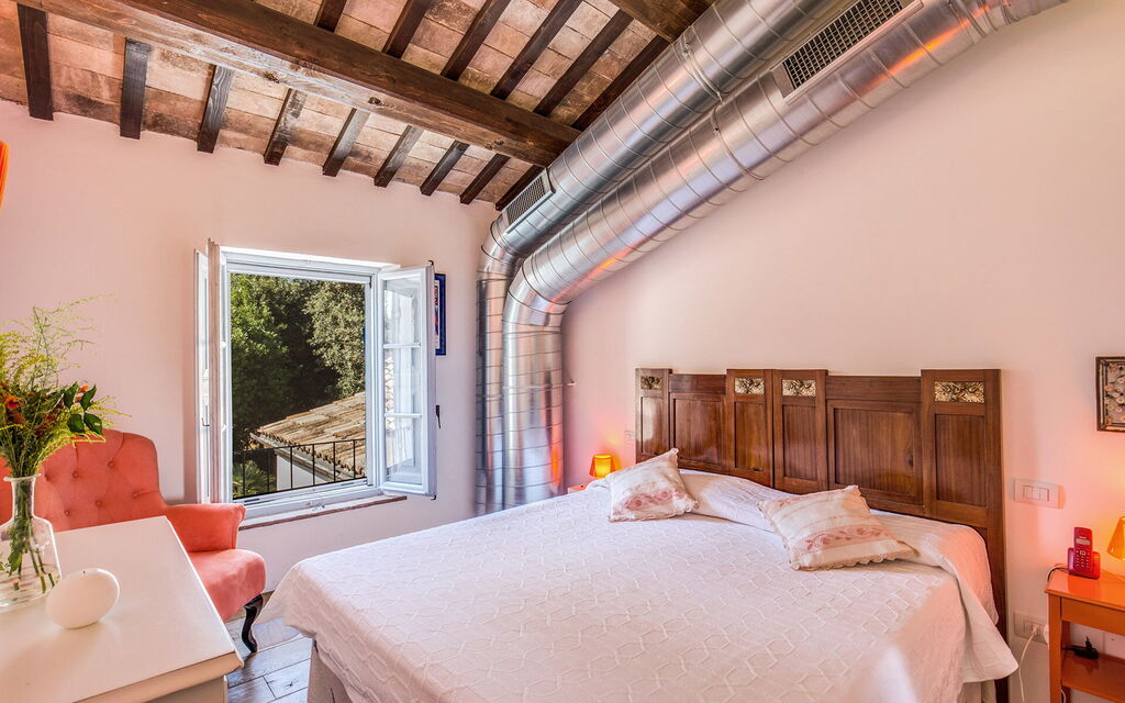 La Corte Del Grano: la-corte-del-grano-abbadia-villa-camera-da-letto