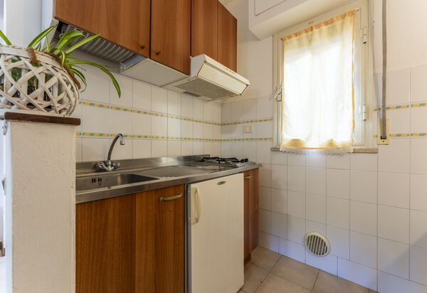Giannella Beach Residence Apartment - Giannella, Grosseto: Autumn, Kitchen, Living Room, Spring, Summer