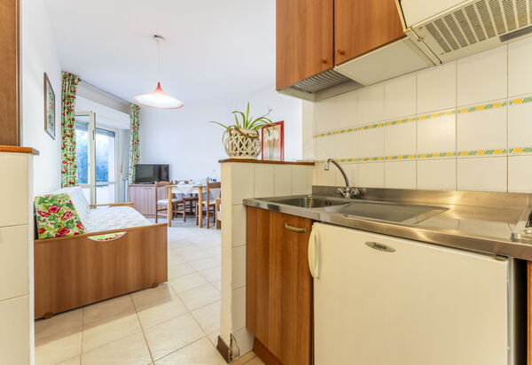 Giannella Beach Residence Apartment - Giannella, Grosseto: Autumn, Kitchen, Living Room, Spring, Summer