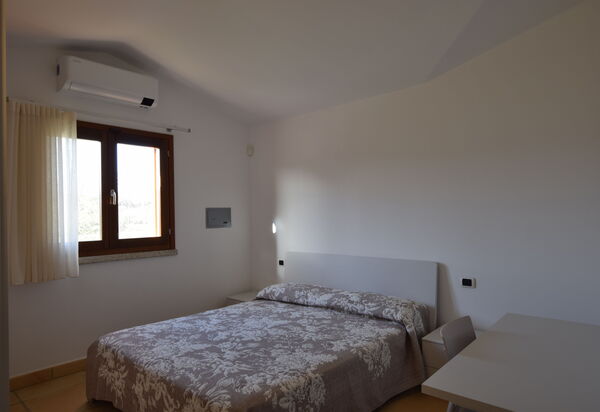 Luisa Apartment In Budoni, Shared Pool: Autunno, Camera da letto, Estate, Primavera